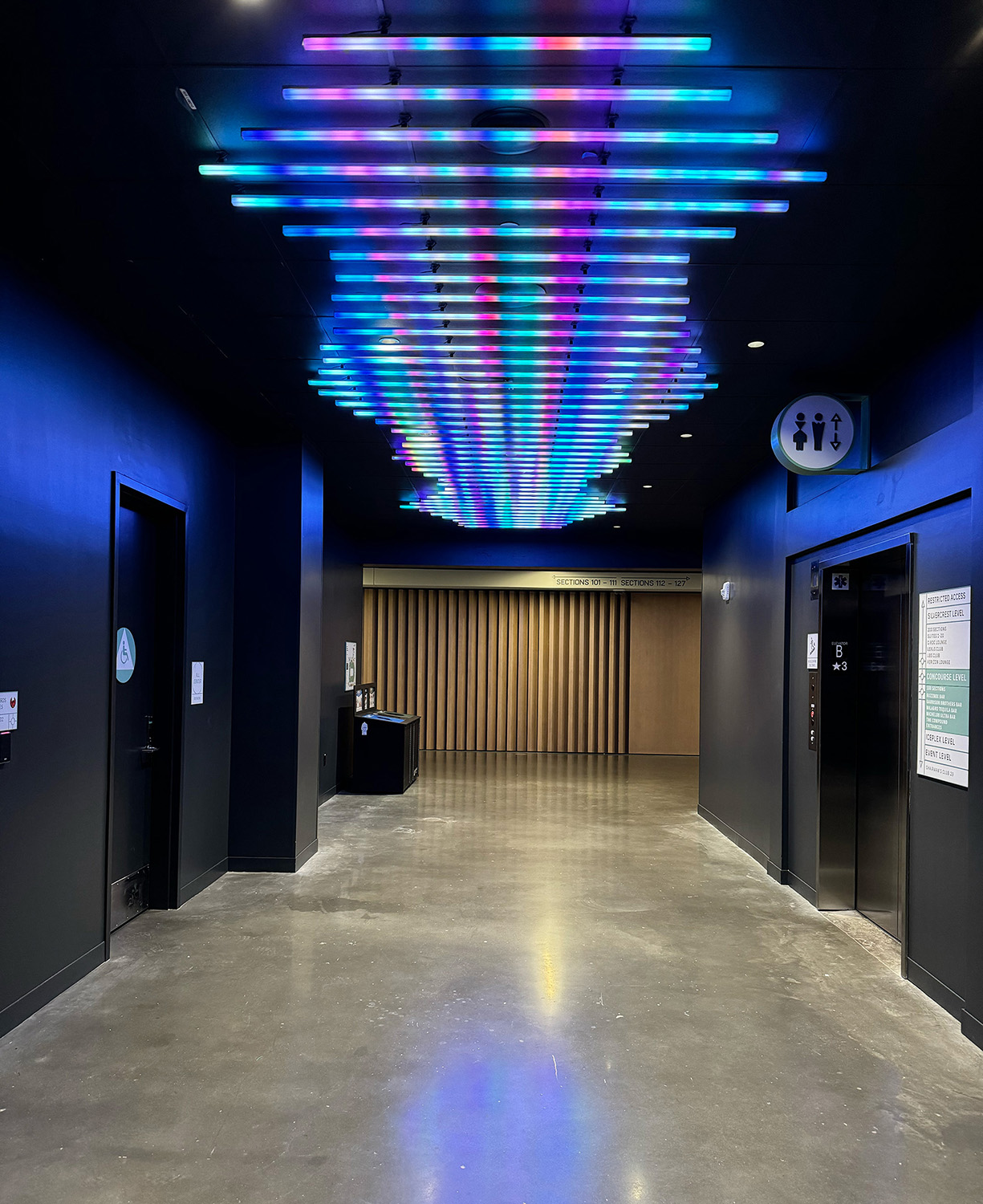 Aurora interactive overhead light installation at Acrisure Arena.
