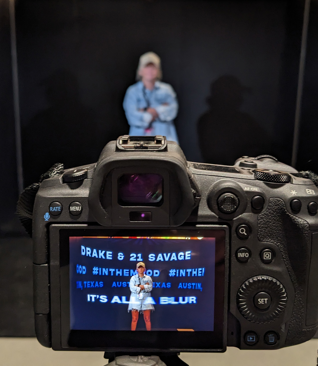 Custom light painting photobooth portrait with colorful long-exposure effects.
